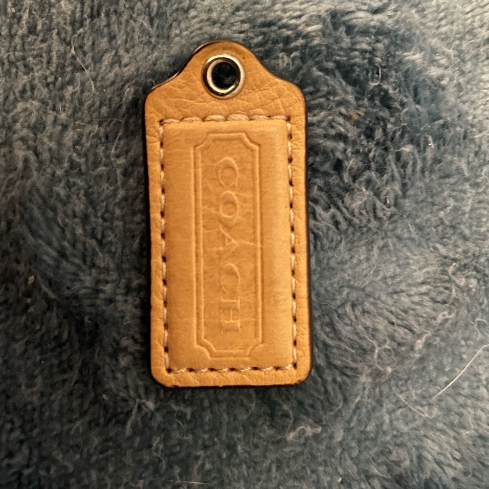 Tan Coach tag
